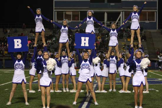 The Bryant High School cheerleaders perform at halftime of Thursday's Senior Night football game. (Photo by Rick Nation)
