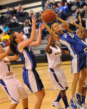 Anna Lowery (5) goes up for a shot. (Photo by Kevin Nagle)