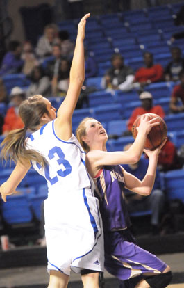 Bryant's Aubree Allen (23) defends against CAC's Taylor Evans. (Photo by Kevin Nagle)