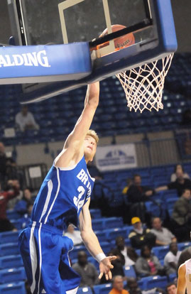 Quinton Motto goes high for 2 of his 22 points Thursday. (Photo by Kevin Nagle)