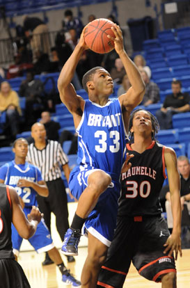 Bryant's Leon Neale (33) goes up for a shot in front of teammate Marcus Wilson (22). (Photo by Kevin Nagle)