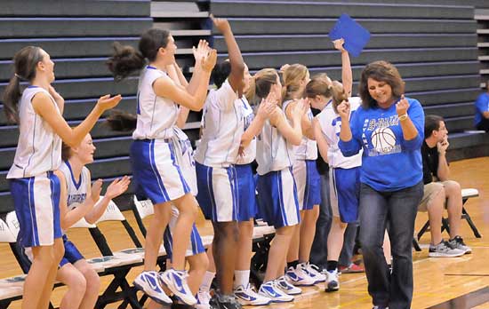 Head coach Rhonda Hall and the Bryant Blue bench celebrate a key play in Saturday's championship game. (Photo by Kevin Nagle)