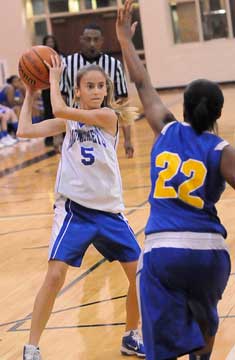 Anna Lowery (5) looks to get a pass past an E-Stem defender. (Photo by Kevin Nagle)