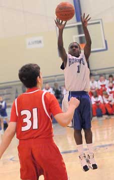 Simeon Watson (1) launches a jumper. (Photo by Kevin Nagle)