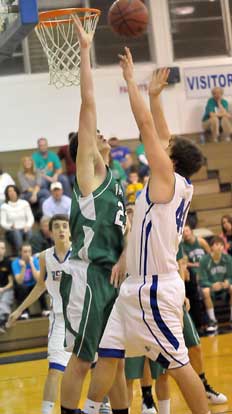 Bryant's Zach Cambron, right, confronts Van Buren's Hooper Vint as Logan Trudell, left, follows the play. (Photo by Kevin Nagle)