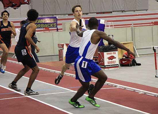 James Glasper reaches back for the baton from Michael Smith during the 4x400 relay Saturday at the State Indoor. (Photo courtesy of Carla Thomas)