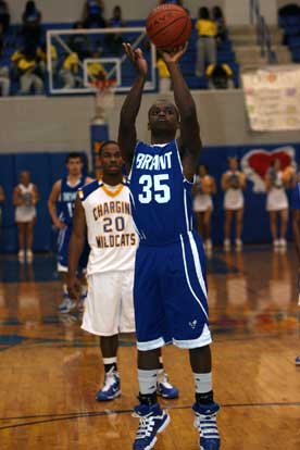 Eric Moore knocks down one of his two free throws. (PHoto by Rick Nation)