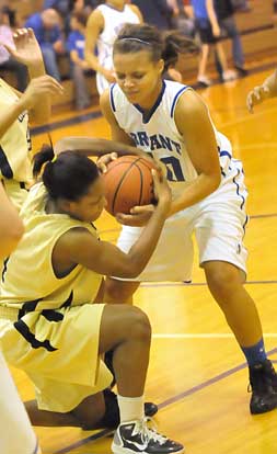 Bryant's Breanna Blundell, right, fights to retain possession. (Photo by Kevin Nagle)