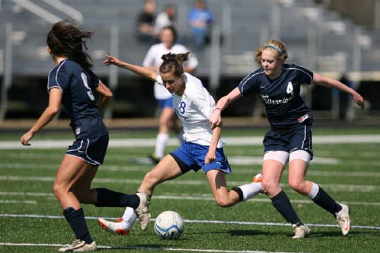 Bryant's Shelby Gartrell splits a pair of Little Rock Christian defenders. (Photo by Rick Nation)