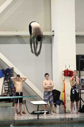 Jordan Combs competes in Friday's 1-meter dive State championships.
