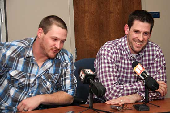 Travis Wood, left, and Cliff Lee enjoy a light moment during Thursday's press conference. (Photo by Rick Nation)