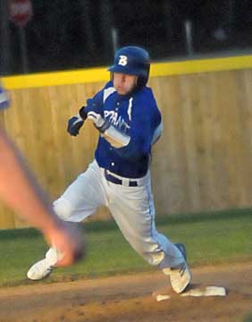 Hayden Daniel rounds second and heads for third. (Photo by Kevin Nagle)