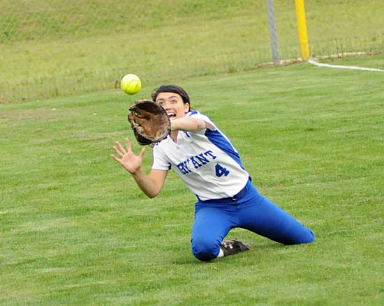 Left fielder Carly Yazza dives for a foul fly during Thursday's game. (Photo by Kevin Nagle)