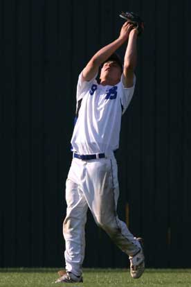 Josh Pultro hauls down a fly to center. (Photo by Rick Nation)