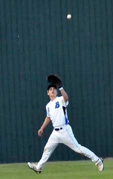 Josh Pultro tracks a fly to center field. (Photo by Kevin Nagle)