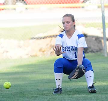 Hannah Rice fields the lone Russellville hit in center field Thursday. (Photo by Kevin Nagle)