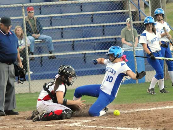 Bryant's Cassidy Wilson (10) slides safely into home during Thursday's game. (Photo by Kevin Nagle)