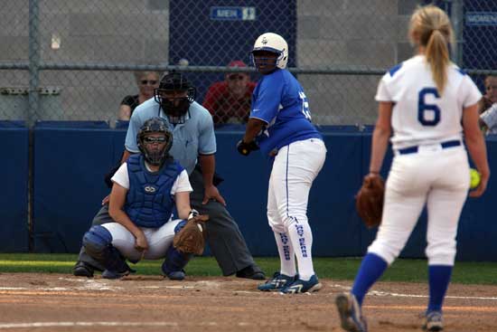 Bryant catcher Jessie Taylor gives the sign for pitcher Peyton Jenkins with Sylvan Hills' Tranice Hayes at the plate. (Photo by Rick Nation)