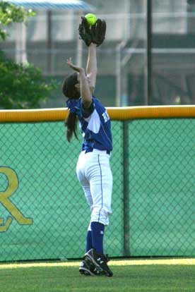 Carly Yazza reaches high for a ball hit to deep left. (Photo by Rick Nation)