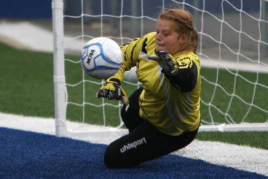 Keeper Kaitlyn Miller dives for a shot during Saturday's match with Fort Smith Southside. (Photo by Rick Nation)