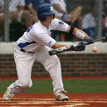 Tyler Brown gets a sacrifice bunt down. (Photo by Rick Nation)