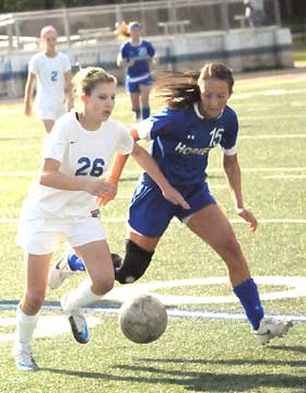 Bryant's Dylan Vail (15) defends. (Photo by Kevin Nagle)