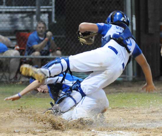 Dakota Besancon scores in a heep. (Photo by Ron Boyd)