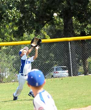 Taylor Dunn settles under a fly to the outfield. (PHoto by Kevin Nagle)