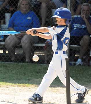 Carson Kemp takes a cut. (Photo by Kevin Nagle)