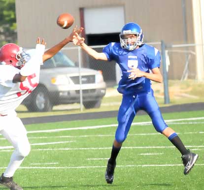 Madison Schrader releases a pass. (Photo by Kevin Nagle)