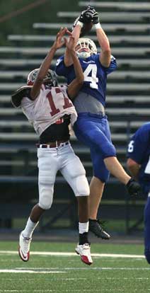 Jesse Johnson breaks up a deep pass. (Photo by Rick Nation)