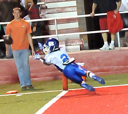 Dillon Winfrey grabs a pass near the goal line. (Photo by Kevin Nagle)