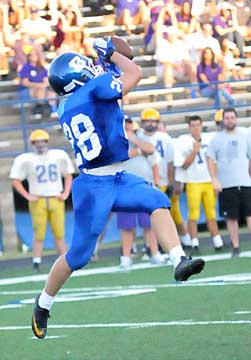 Davis Nossaman leaps to make his interception. (Photo by Kevin Nagle)