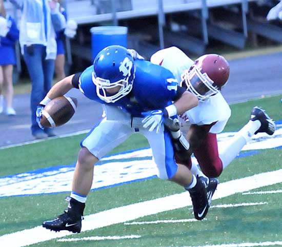 Hayden Daniel strains for extra yardage near the goal line. (Photo by Kevin Nagle)