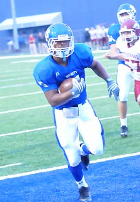 Karon Dismuke scores Bryant's first TD. (Photo by Kevin Nagle)