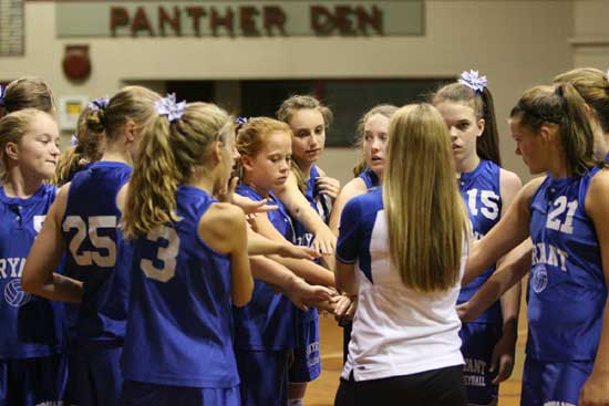Bryant Blue coach Melissa Bragg visits with her team during a break in Thursday's contest. (Photo by Rick Nation)