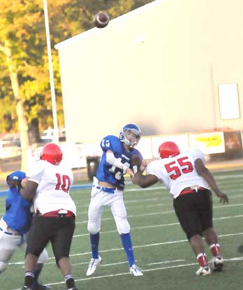Jaret Jacobs launches a pass. (Photo by Kevin Nagle)