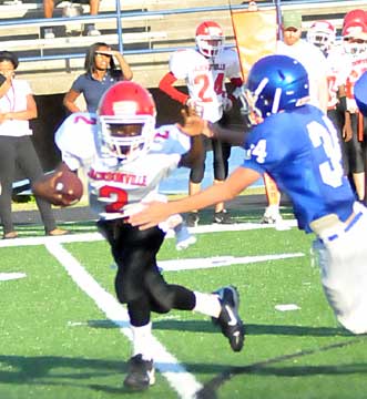 Bryant's Devon Alpe (34) draws a bead on a Jacksonville ball carrier. (Photo by Kevin Nagle)