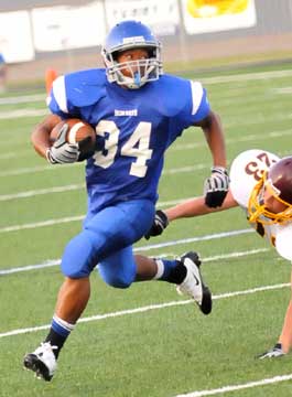 Brushawn Hunter evades Lake Hamilton's Chance Collins. (Photo by Kevin Nagle)