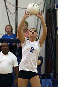 Peyton Thacker (2) sets for a teammate. (Photo by Rick Nation)