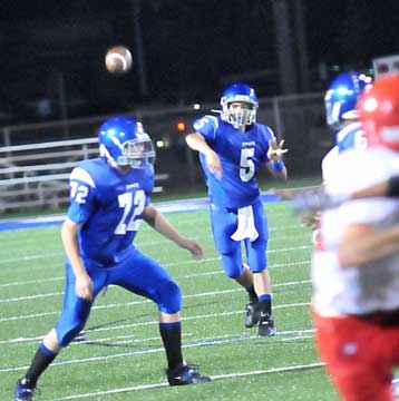 Andrew McBride (72) provides protection for quarterback Brandan Warner's pass. (Photo by Kevin Nagle)