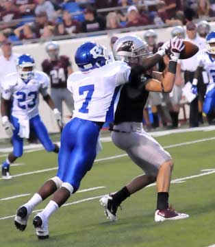 Bryant's Aaron Bell (7) knocks a pass away. (Photo by Kevin Nagle)