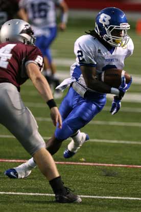 Dillon Winfrey cuts past a Benton defender. (Photo by Rick Nation)