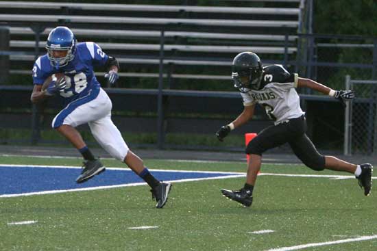 Bryant's Jacob Gorham (28) heads into the end zone after getting behind Hot Springs' cornerback Alex Tobar. (Photo by Rick Nation)