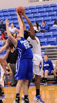 Bryant's Whitney Meyer (50) battles for a rebound. (Photo by Kevin Nagle)