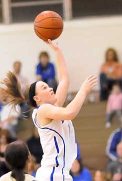 Logan Davis launches a shot off a drive. (Photo by Kevin Nagle)