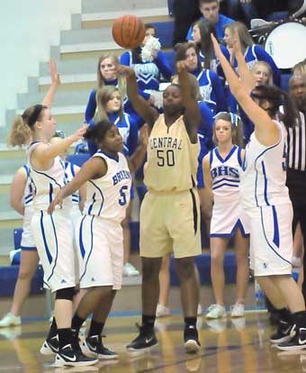 Central's Courtney Hines (50) tries to clear the ball as Bryant's Haley Murphy, left, Dezerea Duckworth and Whitney Meyer, right, converge. (Photo by Kevin Nagle)