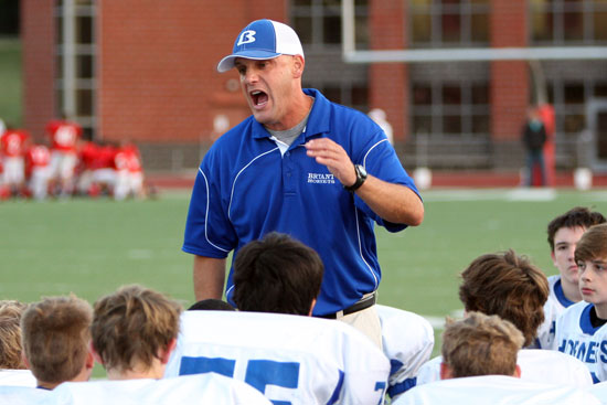 Bryant Blue head coach Dale Jones stresses a point to his team after Thursday's game. (Photo by Rick Nation)