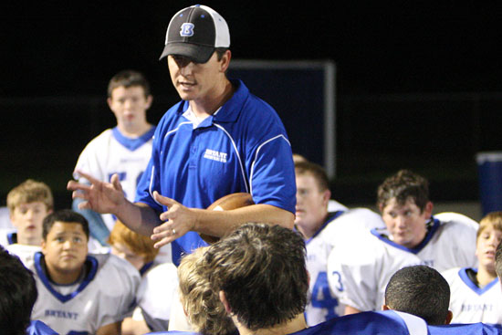 Bryant White coach Brad Smothermon meets with his team after the Hornet Bowl. (Photo by Rick Nation)