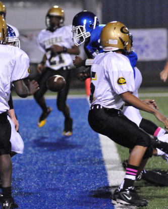 Bryant's Savonte Turner fumbles as he reaches the goal line. (Photo by Kevin Nagle)